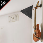 Foroomaco triangular pyramid bass trap with a guitar